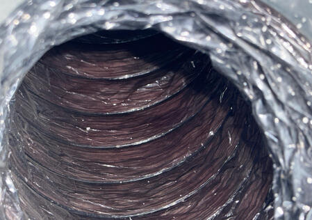 Professionally cleaned air duct with improved airflow.